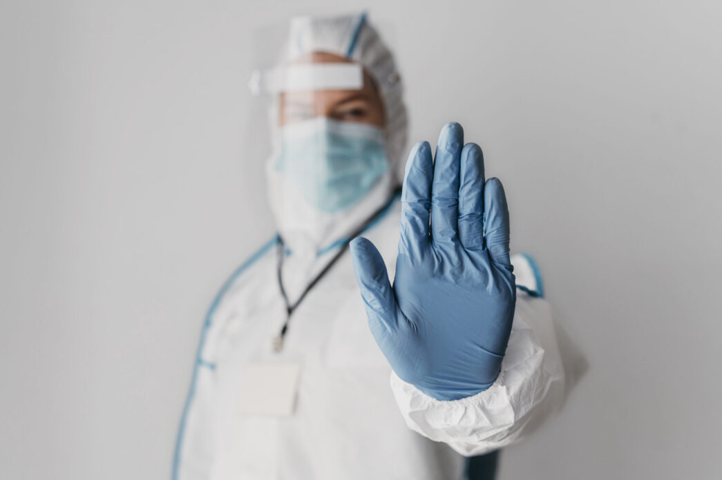 front-view-doctor-doing-the-stop-sign